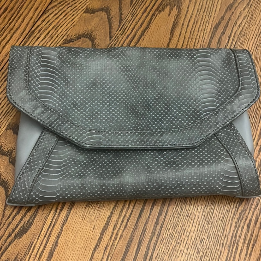 Faux snakeskin clutch that can be used as purse with optional chain